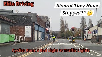 Crazy Cyclist Runs a Red Light at Traffic Lights Video Clip, Should They Have Stopped Here?? #video