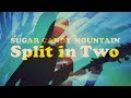 Split in two by sugar candy mountain