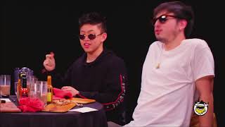 Rich Brian and Joji singing Midsummer Madness on Hot Ones