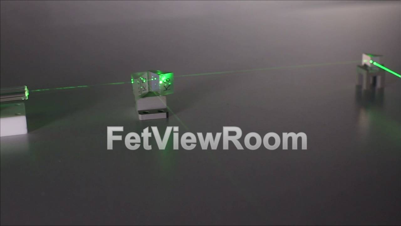 Continuous wave green laser propagates through the optical components. Laser Safety