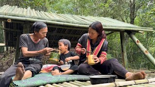 A single mother and her son cut bamboo to build a house. The kind man helped