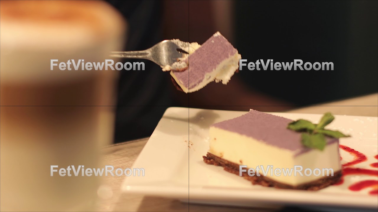 A beautiful piece of cake lies on a plate.