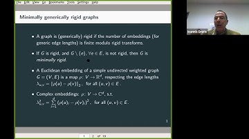Upper bounds on the number of rigid graph embeddings
