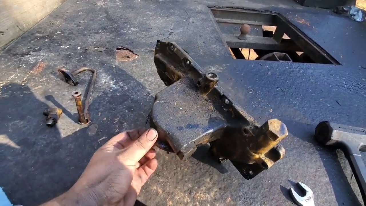 3126 CAT oil cooler - YouTube