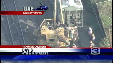 Workers Clean Up Train Derailment