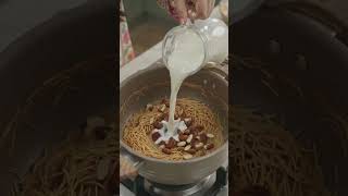 pakistani girl cooking sheer khurma