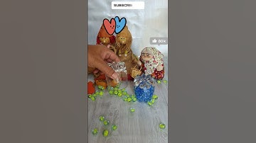 Dancing Marbles Backwards: What do you see? #ReverseMotion #GlassMarbles #MarbleArt