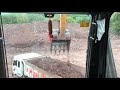 SANY SY365HPro Excavator Digging Loading Dirt Into Dump Truck On Quarry Cat 320D