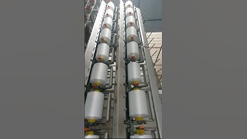 POLYESTER, NYLON AND KOTA YARN WINDING MACHINE.