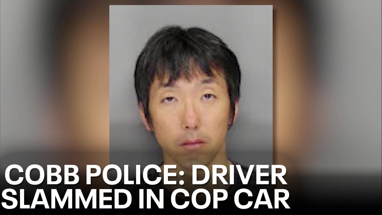 Driver jailed for hitting officer during traffic stop - YouTube