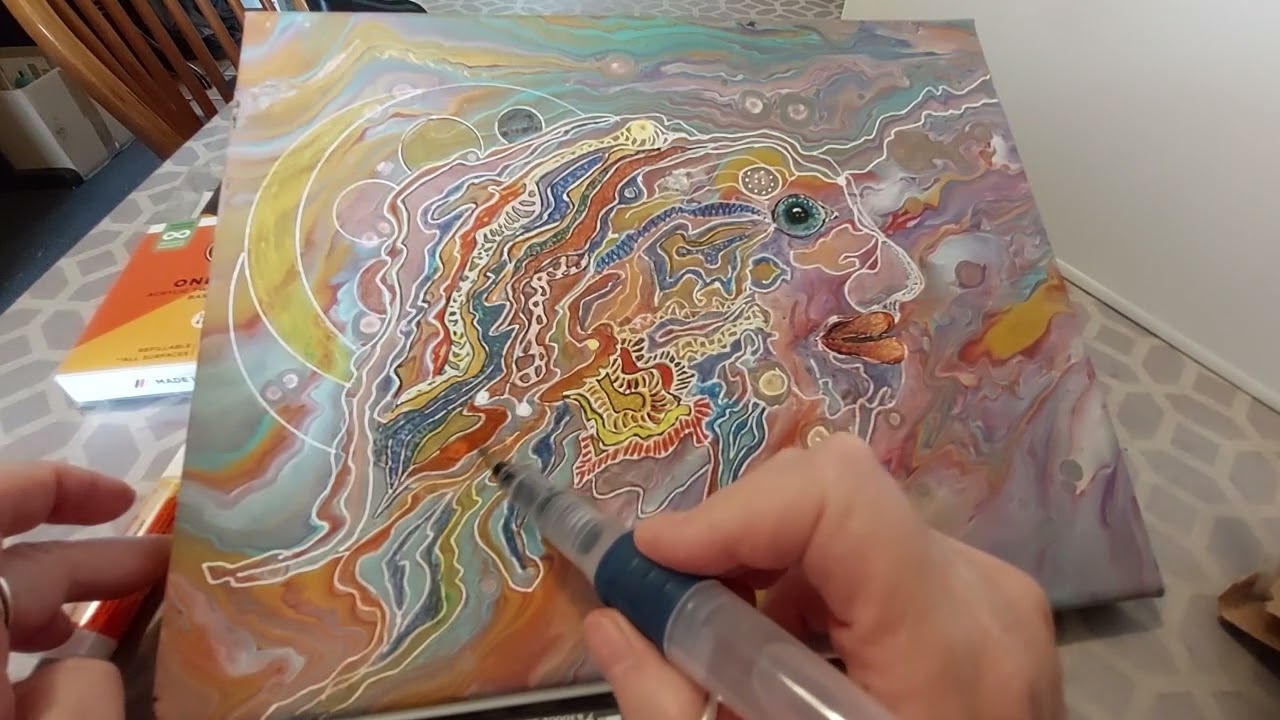 Adding detail on an acrylic pouring painting