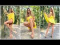 Polishgirl in heels and summer yellow dress walking in the forest 4k