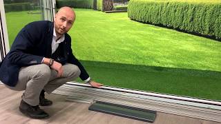 What is the difference in threshold profiles for bifold doors?