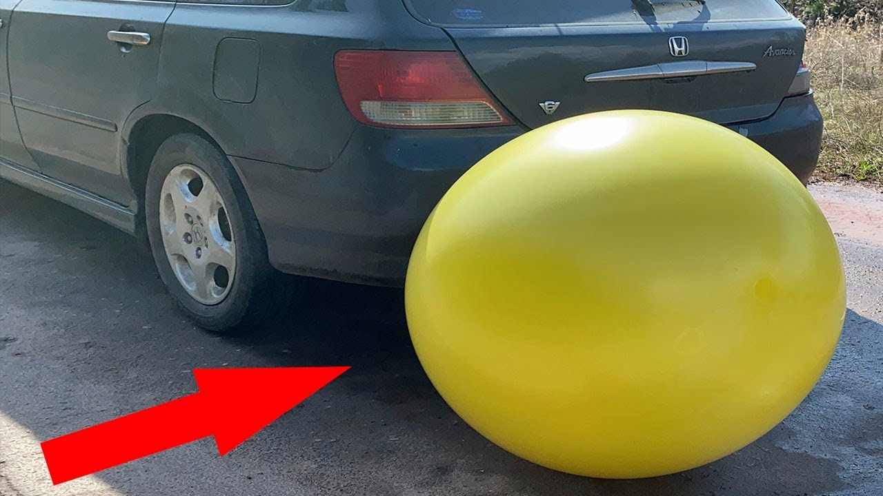 EXPERIMENT: Huge ball against the car - YouTube