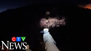 Caught on cam: Firefighters trapped by wildfire rescued by chopper in California's Woodward fire.