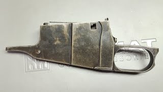 Examining an 1894 Chatellerault Mosin magazine