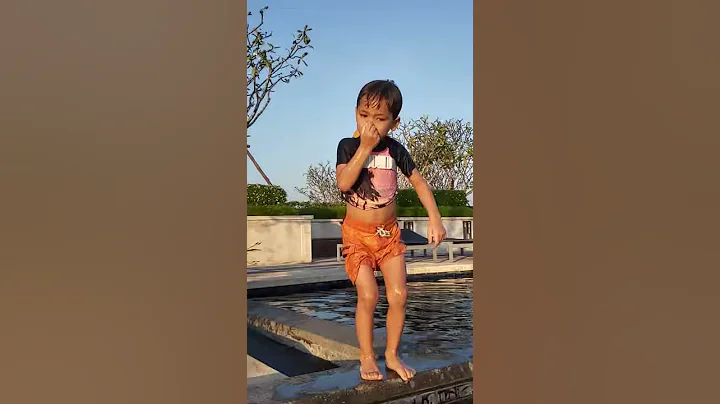 Lucas jumping into the water.