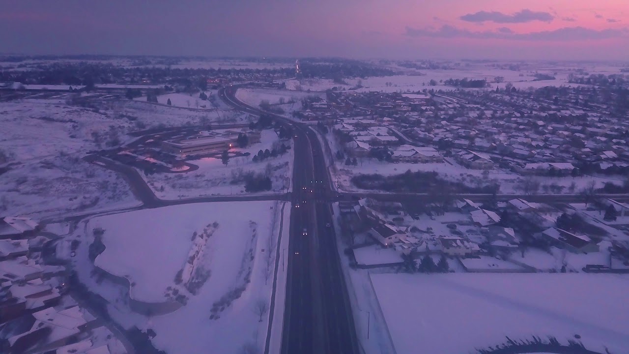 Aerial Drone Footage of South Loveland CO on a Snowy Afternoon