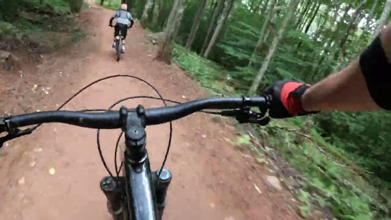 Yoav behind Idan snowshoe August 2023