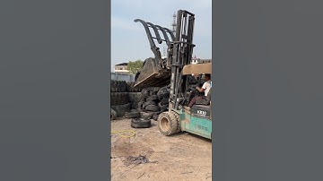 Forklift unloading tires   good machinery can improve work efficiency