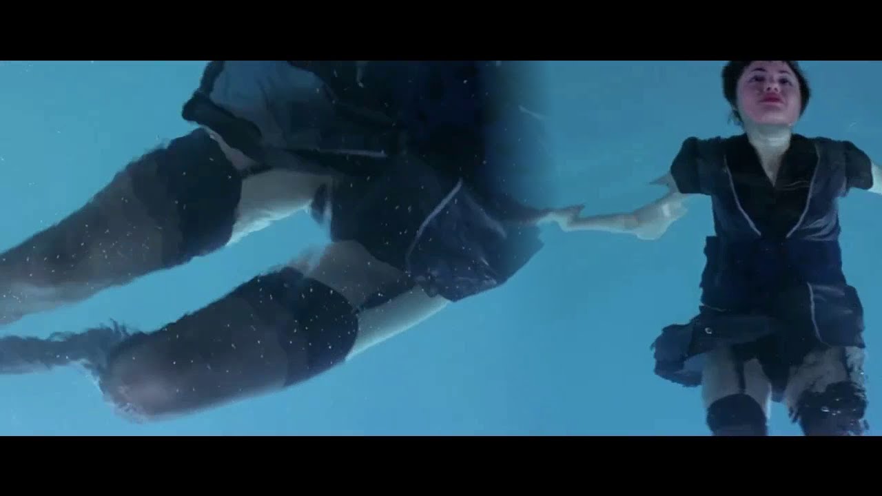 Angelina Jolie ends up in a swimming pool with black stockings & garter belt - 1995 movie Hackers