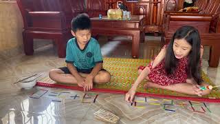 #22 the thinking game involves moving counting sticks to perform the correct calculation.