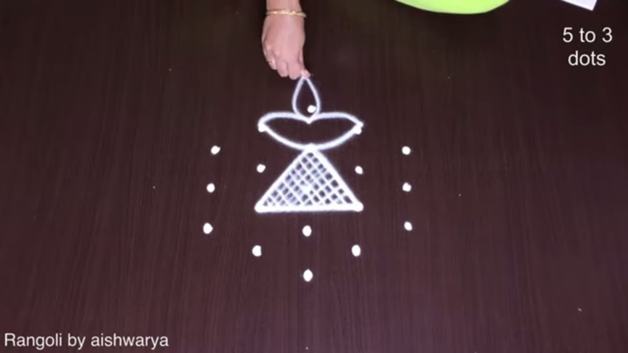 Simple Muggulu With Diya Kolams