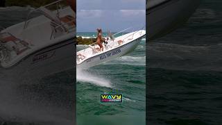 Blue top legend exits a rough Boca Inlet | Wavy Boats