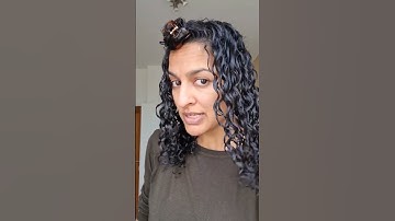 Know why some frizz is normal for curly hair. learn curly hair styling basics with Asha Barrak