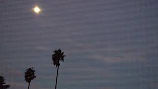 5:18pm Jan 1, 2026 - High Clouds Partly Cloudy & SE Light Winds 
