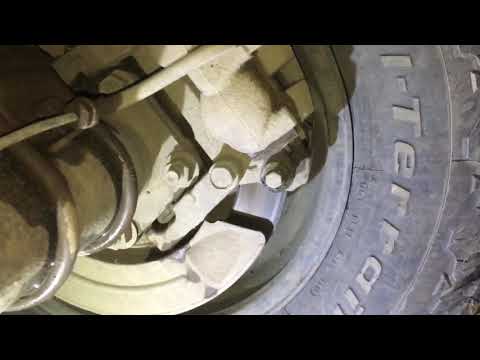 Como ajustar os freios parque em um 2005 Dodge Ram 2500, com freios a disco