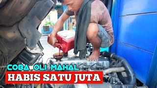 Truk isuzu elf | aku coba oli mahal