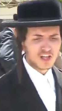 Jewish NPC spitting and chanting Shiksa