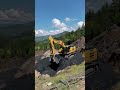 Excavator digging for coal on a mountain with beautiful natural scenery around it#shorts
