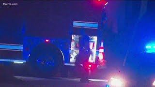 Police investigate after man found burned in car in Stone Mountain
