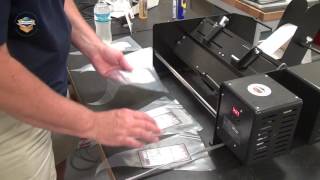 Flexmatic Applying Labels to Triangular Bags