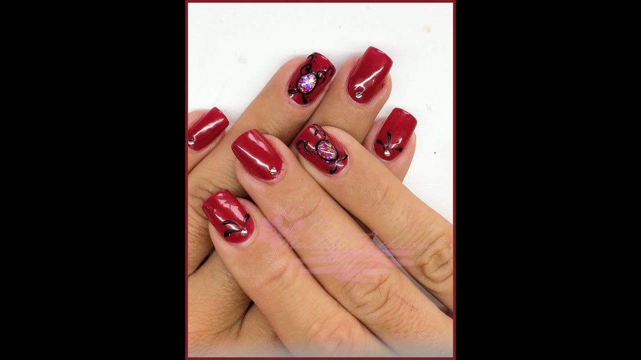Nail Art Monocolore rosso con gioiello Ricostruzione Madda