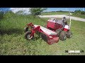 Ventrac Mowing on the Hillside! Ventrac 4500 tackles this steep slope and makes it look easy!