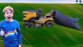 Picking up leaves with a HUGE mower bag! | Lawn Mower videos for kids | Fall Yard work