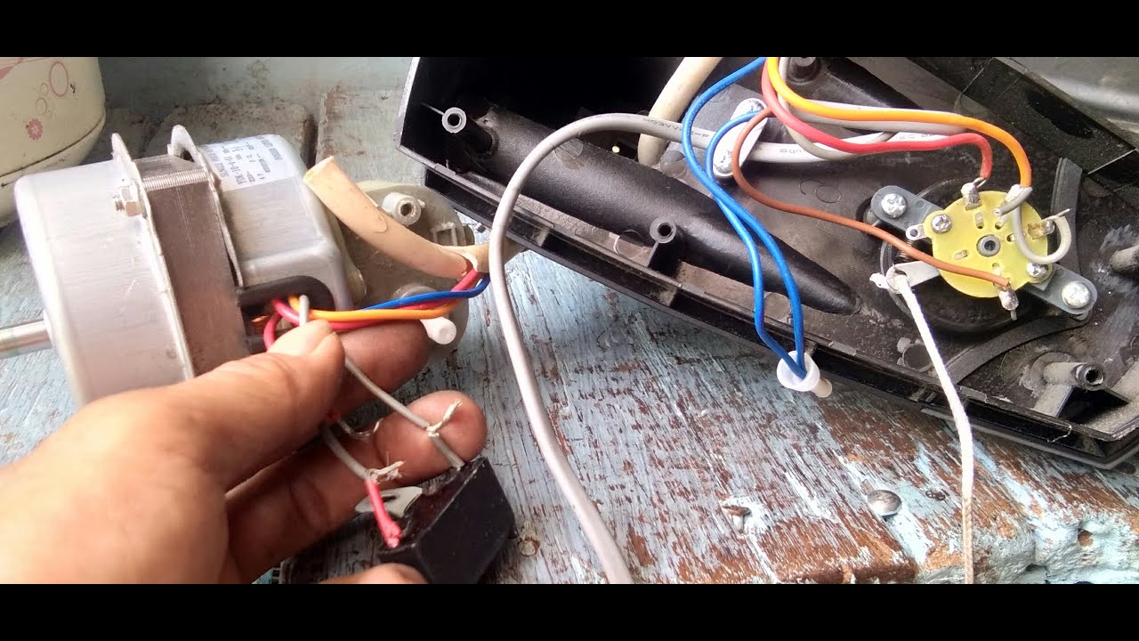 kipas angin sudah di ganti capasitor  cuman berdengung ,service kipas cosmos dinding