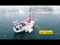 Riding out a snowstorm in our cozy sailboat in alaska