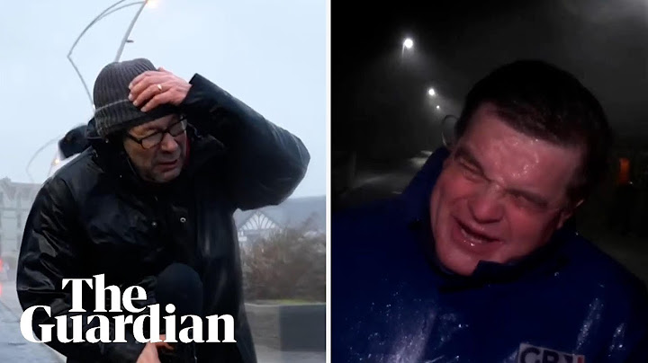 News reporters blown around by heavy winds during Storm Éowyn
