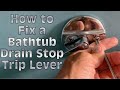 How to fix and rehab a 50 year old bathtub trip-lever drain stop with broken screws.
