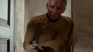 Star Trek Omega Glory Spock caught in phaser blastwave