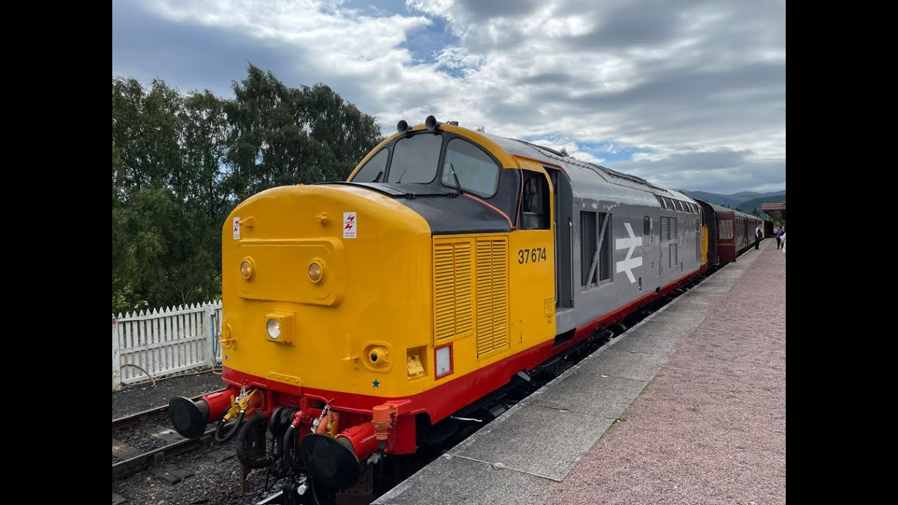 Class 37 674 hauling royal Scotsman into Aviemore station 