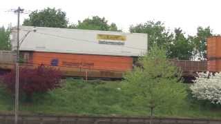 Fast CSX Train Eastbound on Elevated Tracks