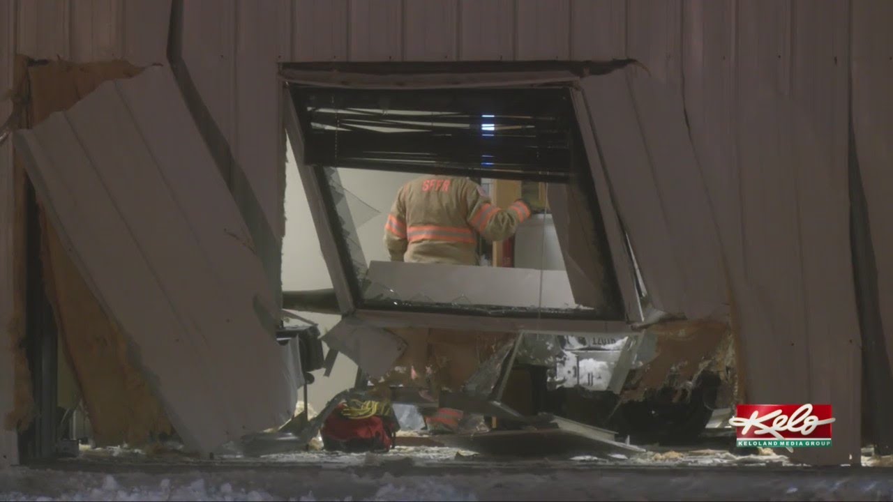 Car crashes into building in north Sioux Falls - YouTube