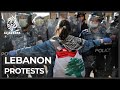 One dead, dozens injured in Lebanon riots with banks smashed