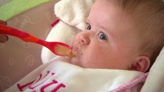 Introducing solid food to babies.