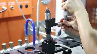 How to fix the Denso fuel injector on the ZQYM-718 common rail test bench for testing?